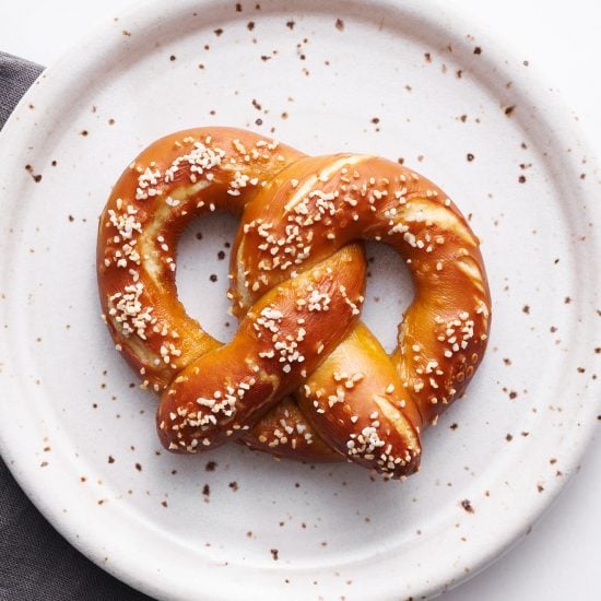 german style soft pretzel on a plate