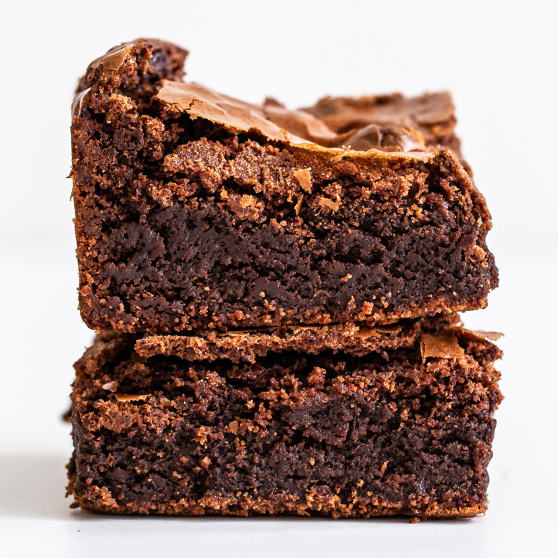 the most decadent, fudgy brownies you'll ever have, stacked two high
