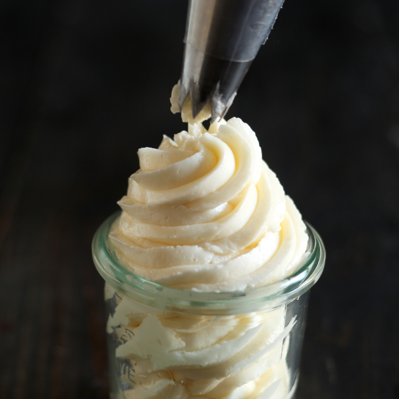 silky smooth Swiss meringue buttercream being piped